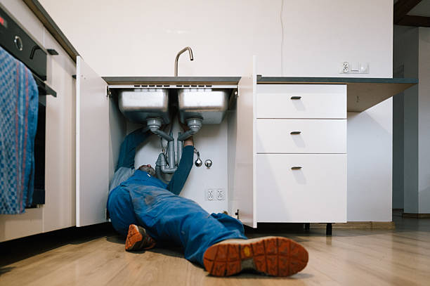 Professional Drain Cleaning technician working in Marshall, AR